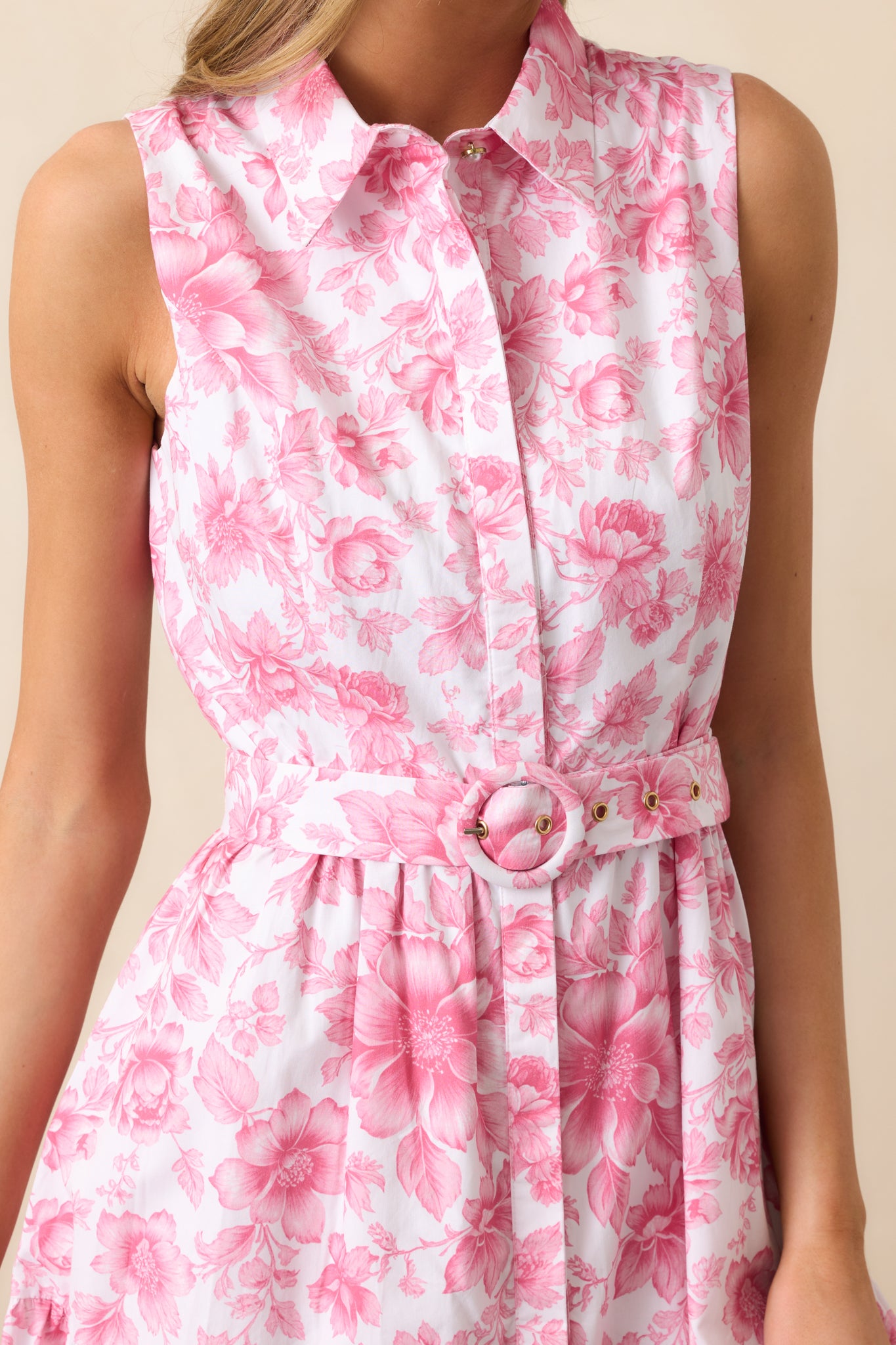 A close-up of the maxi dress highlighting the crisp collared neckline, functional button front, and smooth fabric texture.