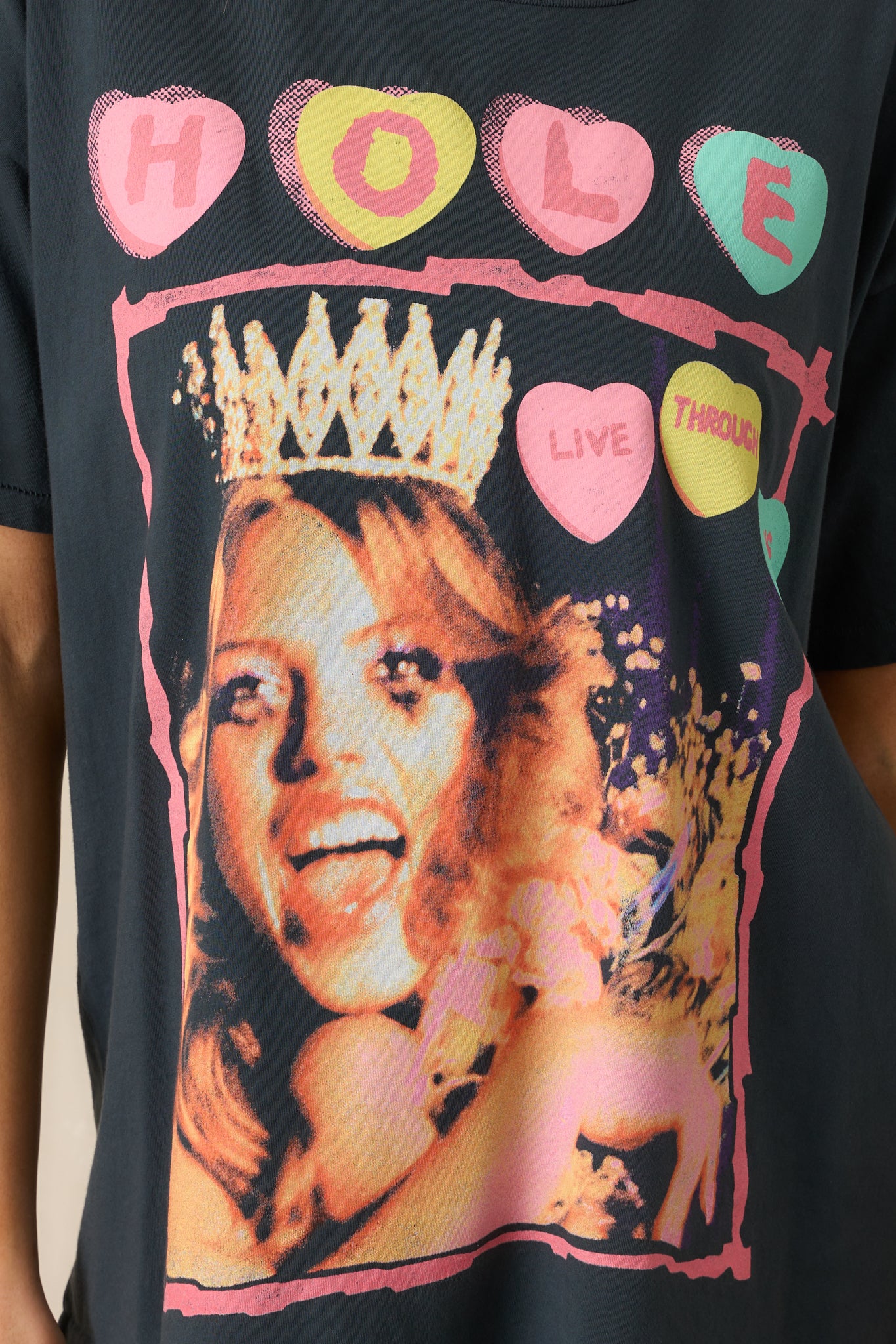A detailed look at the front graphic, emphasizing the intricate design elements and vintage aesthetic.
