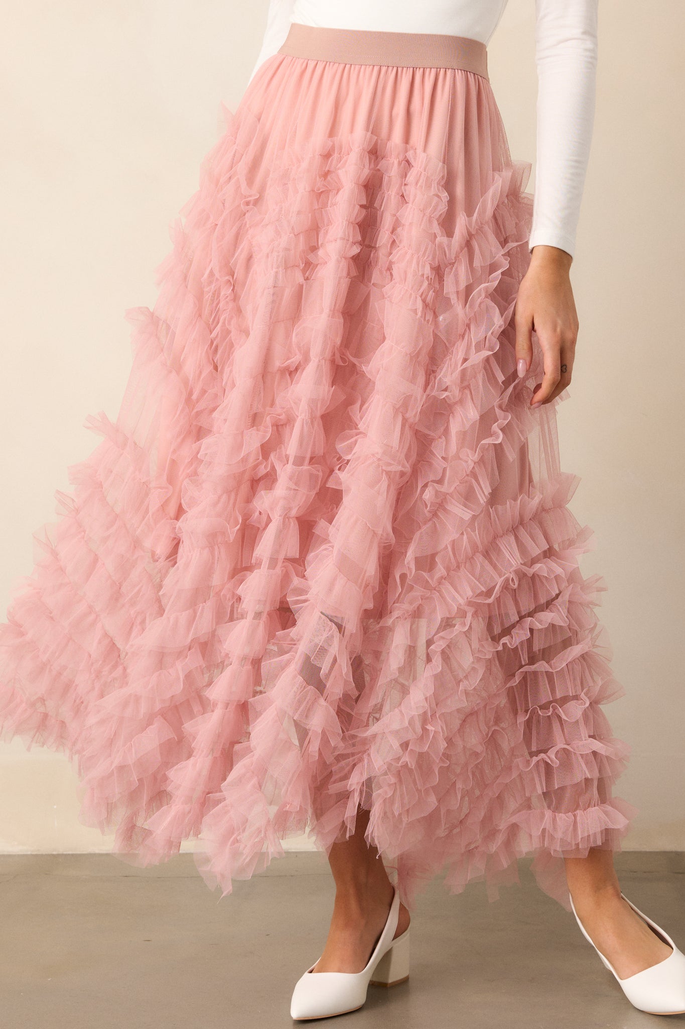 The skirt displayed from waist to hem, highlighting the elastic waistband and layered design.