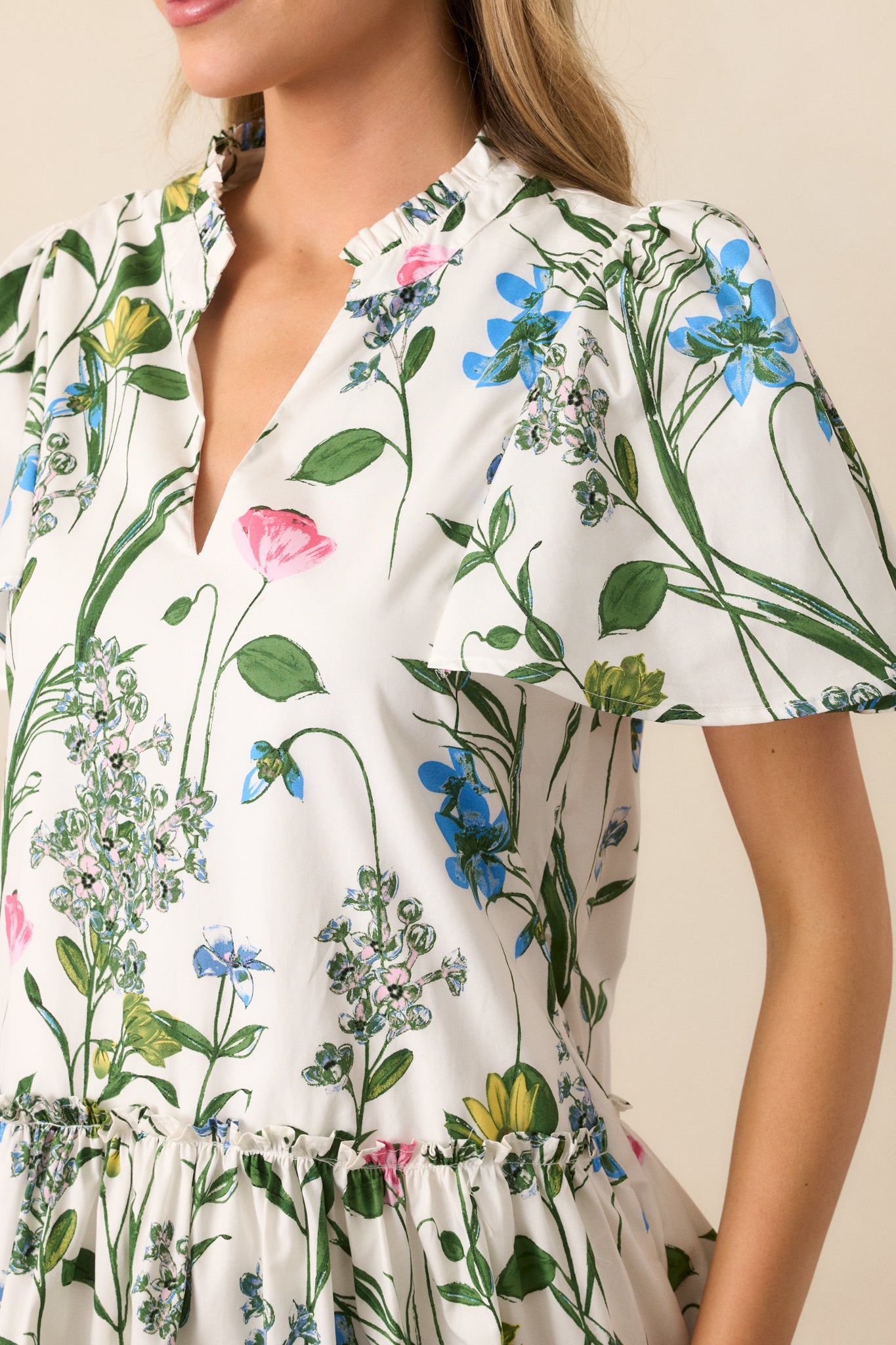  A detailed view of the multicolor floral print, showcasing its intricate patterns and vibrant hues.