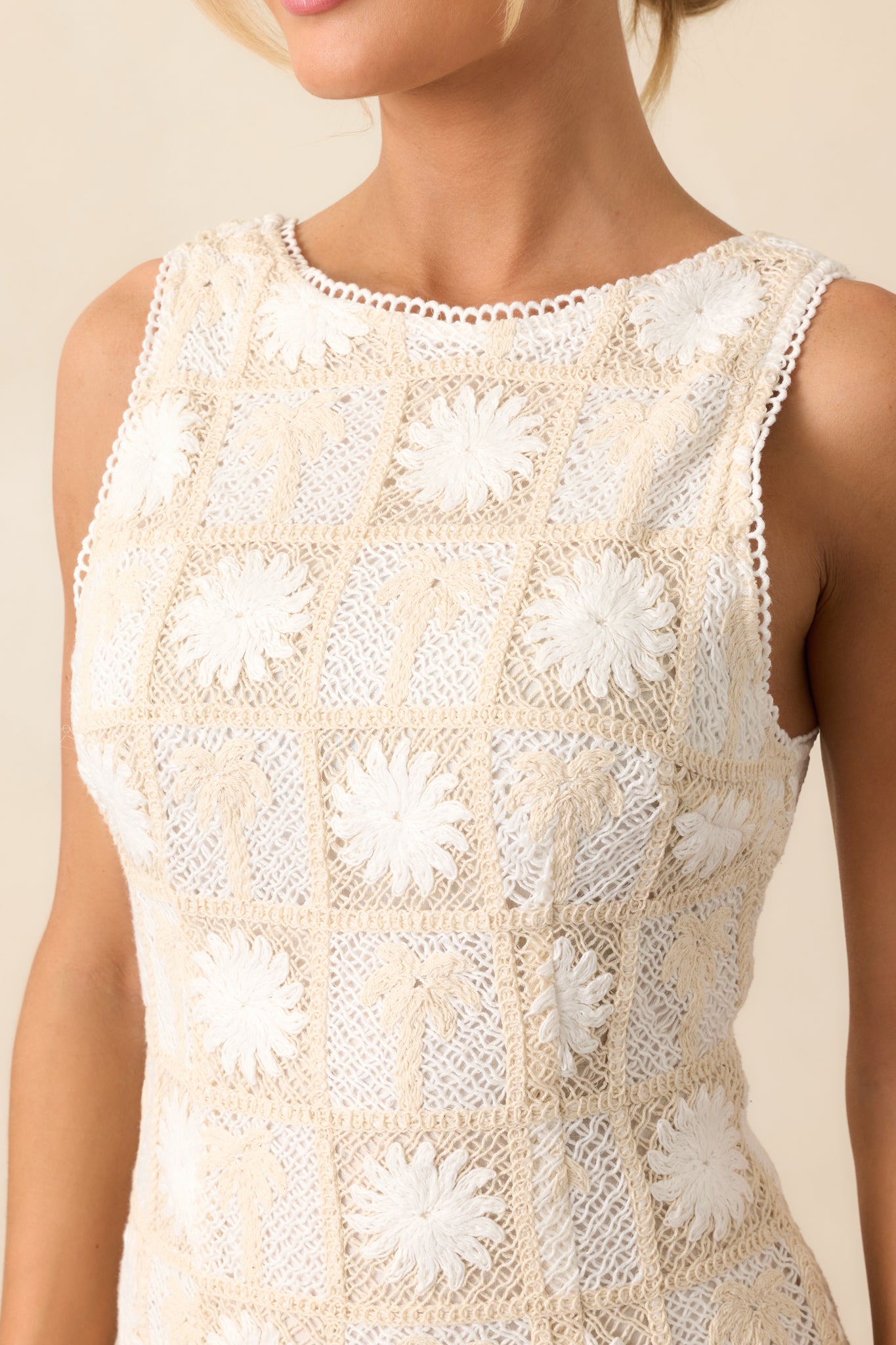 A close-up of the fabric showcases the intricate checkerboard print and fine details.