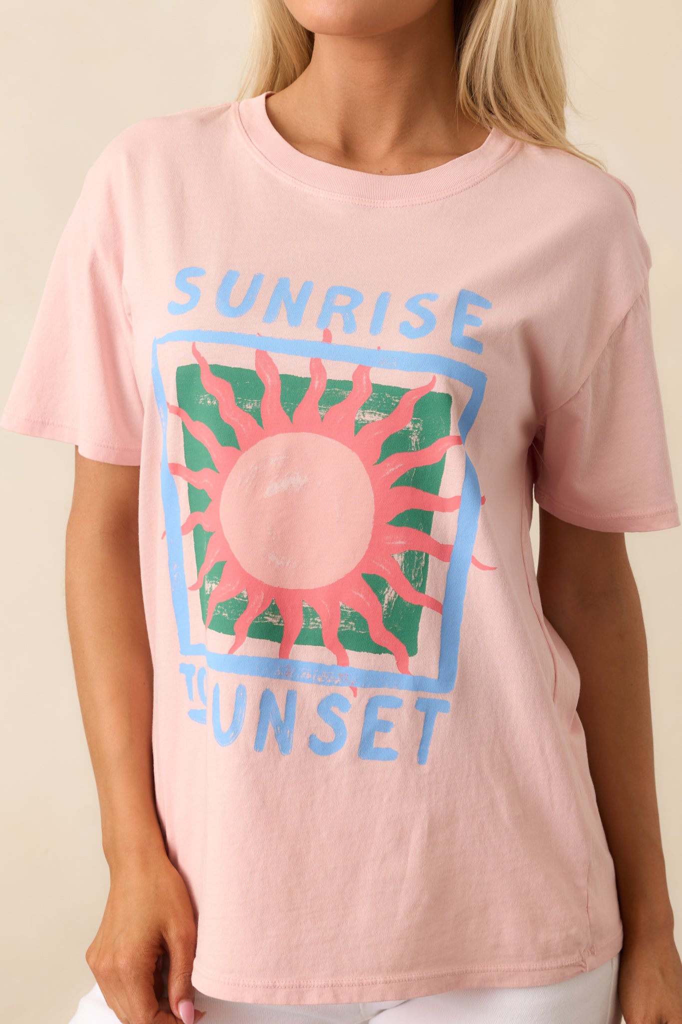 A close-up of the "Sunrise To Sunset" graphic, showcasing the vibrant colors and bold typography.


