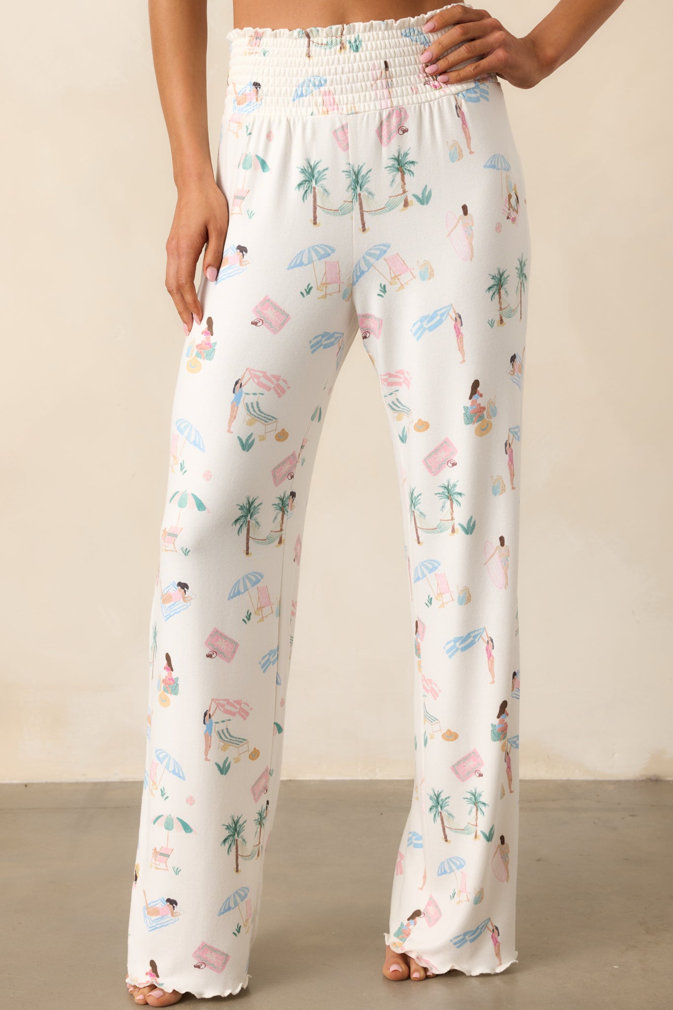 A close-up of the relaxed straight leg design, highlighting the soft fabric and beach print on these stylish, comfortable pants.