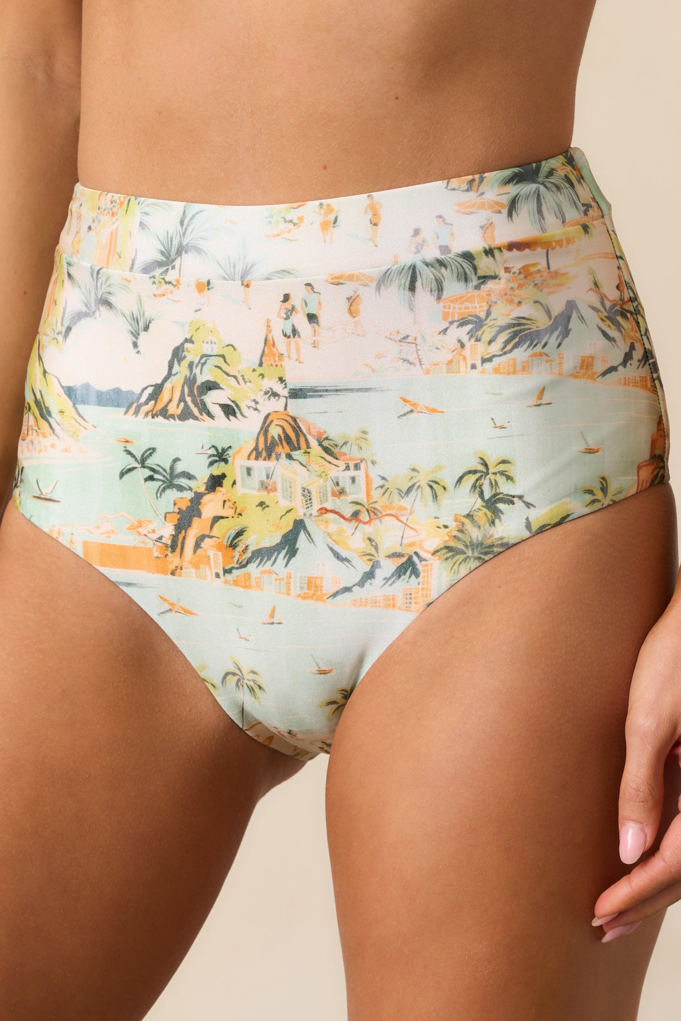 A closer look at the high-waisted design, accentuating the structured fit of the beachline-print bikini bottoms.